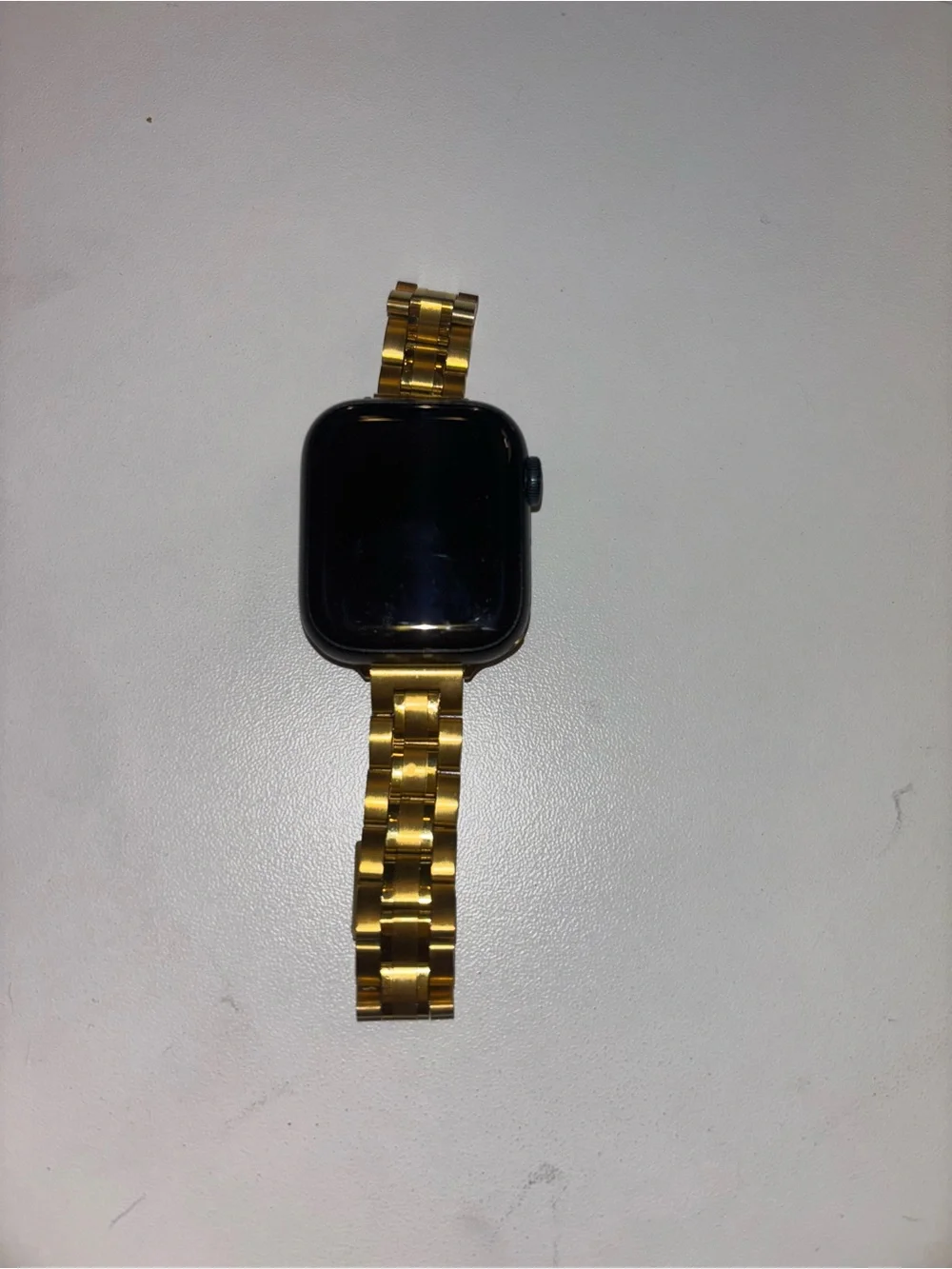 Apple Watch Series 9 (GPS) with Gold Metal Band, and 7 additional silicone bands
